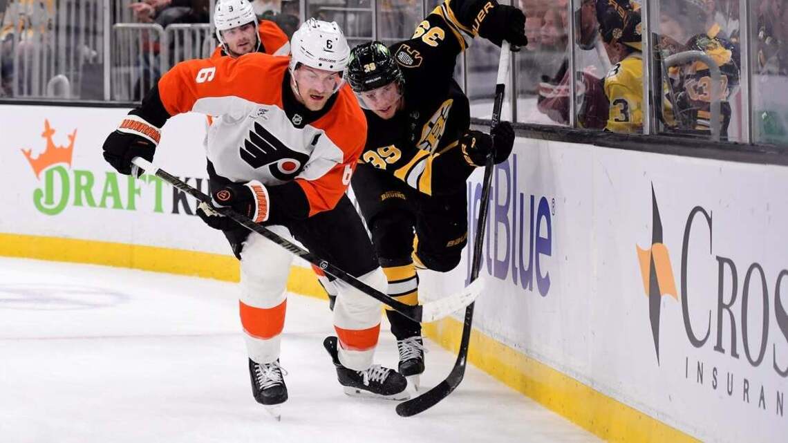 Bruins score 3 goals in final period, keep Flyers winless