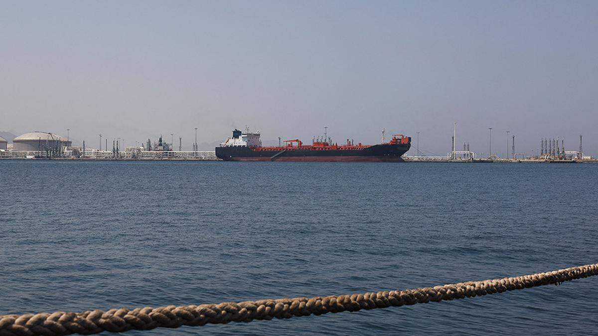 An oil/chemical tanker sits at the Port of Fujairah, United Arab Emirates, on May 6. Global oil prices fell nearly 7% on Monday as optimism grew that the United States and Iran were moving closer to a peace deal that would reopen the strait.