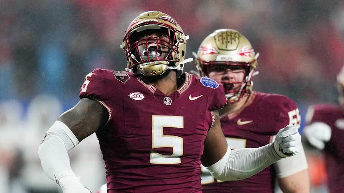  Dec 2, 2023; Charlotte, NC, USA; Florida State Seminoles defensive lineman Jared Verse (5) reacts during the fourth quarter against the Louisville Cardinals at Bank of America Stadium. Mandatory Credit: Jim Dedmon-Imagn Images | Jim Dedmon-Imagn Images 