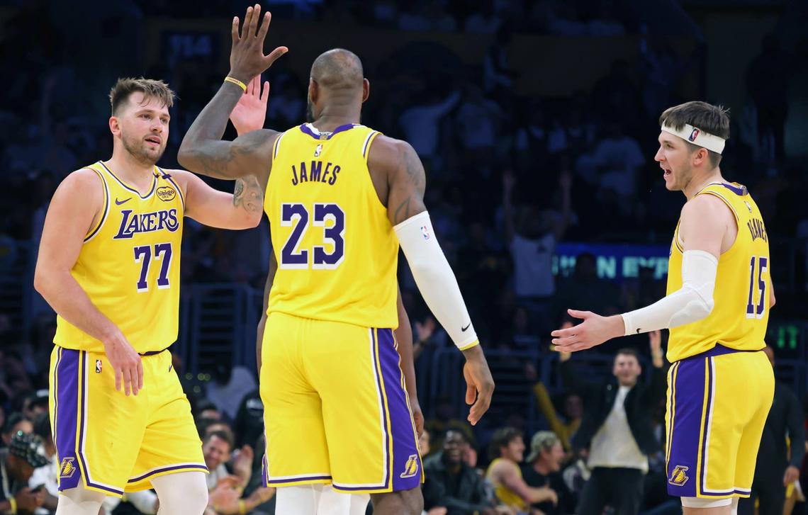  Los Angeles Lakers stars Luka Doncic (77), LeBron James (23) and Austin Reaves (15). Jason Parkhurst-Imagn Images
