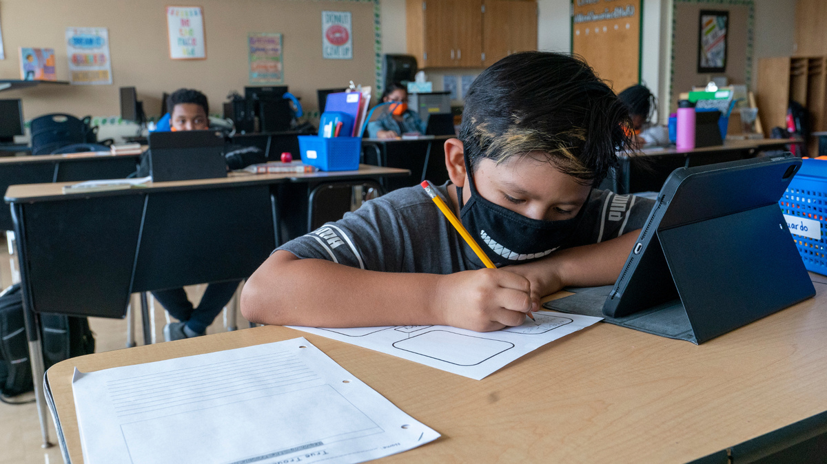 Schools in South Carolina are weighing whether to keep their face mask mandates in place for the 2021-2022 school year. The state reported 205 new COVID-19 cases and 12 coronavirus-related deaths on Wednesday, March 2. Roughly 54% of eligible residents are fully vaccinated. (AP Photo/Mary Altaffer, FIle)