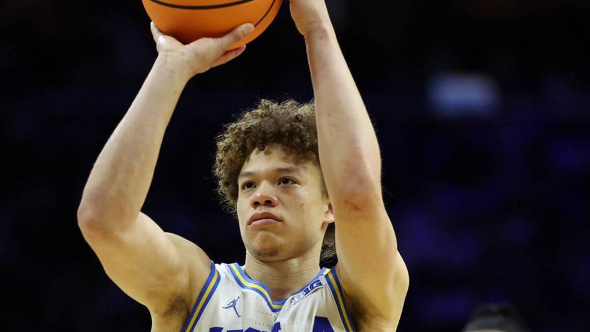  Mar 20, 2026; Philadelphia, PA, USA; UCLA Bruins guard Trent Perry (0) shoots the ball in the second half during a first round game of the men's 2026 NCAA Tournament at Xfinity Mobile Arena. Mandatory Credit: Bill Streicher-Imagn Images | Bill Streicher-Imagn Images 