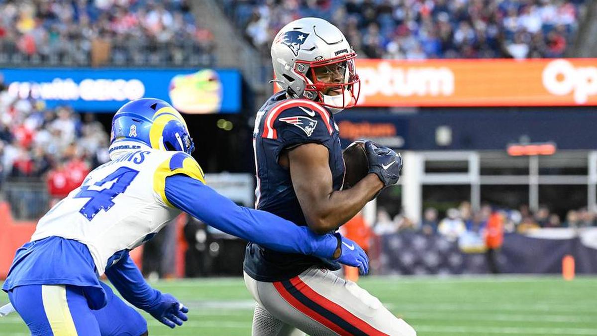  Nov 17, 2024; Foxborough, Massachusetts, USA; New England Patriots wide receiver Kayshon Boutte (9) tries to break a tackle by Los Angeles Rams cornerback Darious Williams (24) during the second half at Gillette Stadium. Mandatory Credit: Eric Canha-Imagn Images | Eric Canha-Imagn Images 