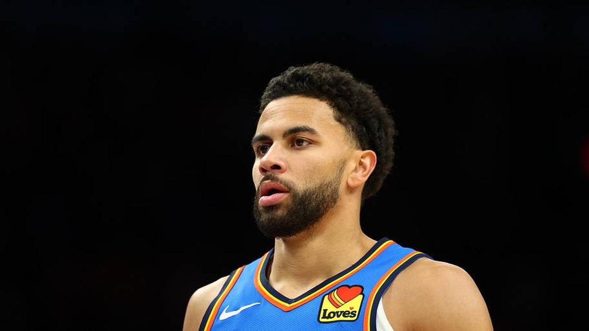  Apr 27, 2026; Phoenix, Arizona, USA; Oklahoma City Thunder guard Ajay Mitchell (25) against the Phoenix Suns during game four of the first round of the 2026 NBA Playoffs at Mortgage Matchup Center. | Mark J. Rebilas-Imagn Images 