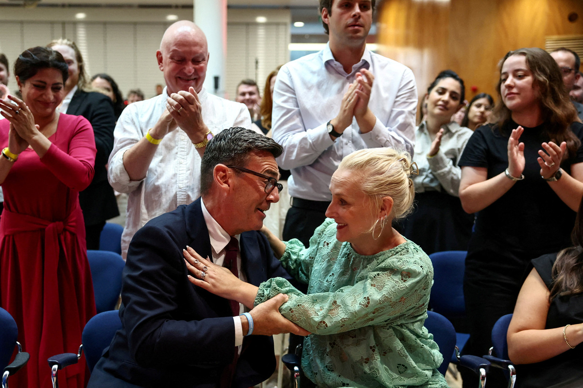 Andy Burnham greets his wife Marie-France van Heel as he is confirmed as the Labour Party's new leader and the country's next Prime Minister, during 'Labour's Special Conference' in London, Britain, July 17, 2026. HENRY NICHOLLS/Pool via REUTERS     TPX IMAGES OF THE DAY