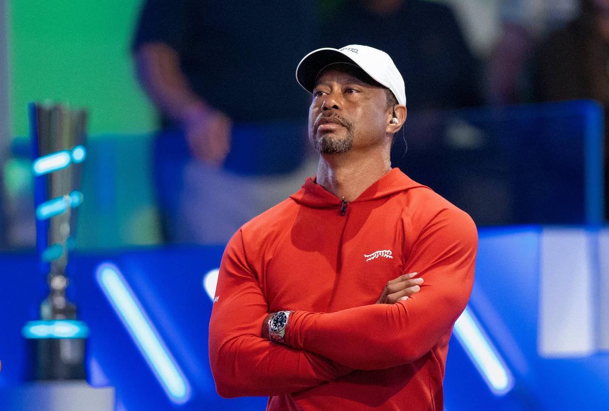  Tiger Woods of Jupiter Links GC watches his team against Boston Common Golf during TGL match at SoFi Center on March 17, 2026, in Palm Beach Gardens, Florida. 