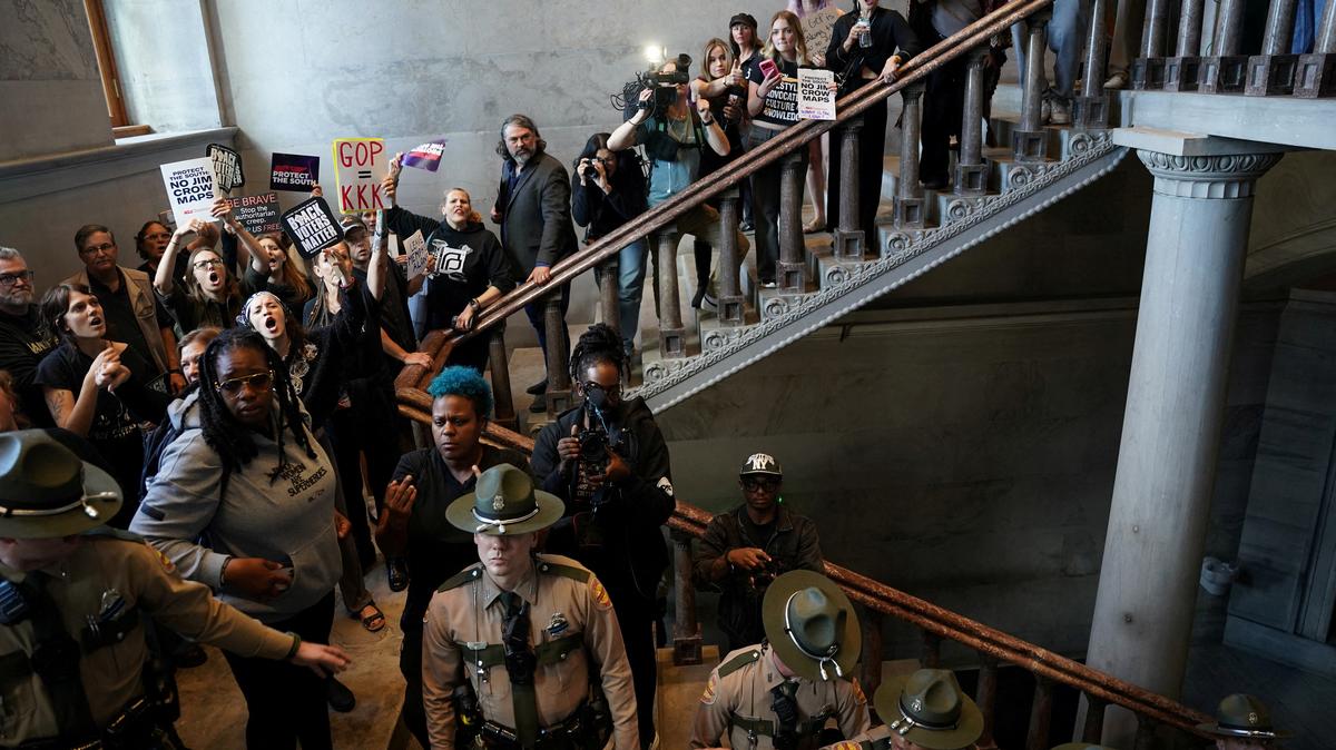 FILE PHOTO: Demonstrators protest inside the Tennessee state Capitol on the final day of a special session in Nashville, Tennessee, U.S., May 7, 2026. REUTERS/Seth Herald/File Photo