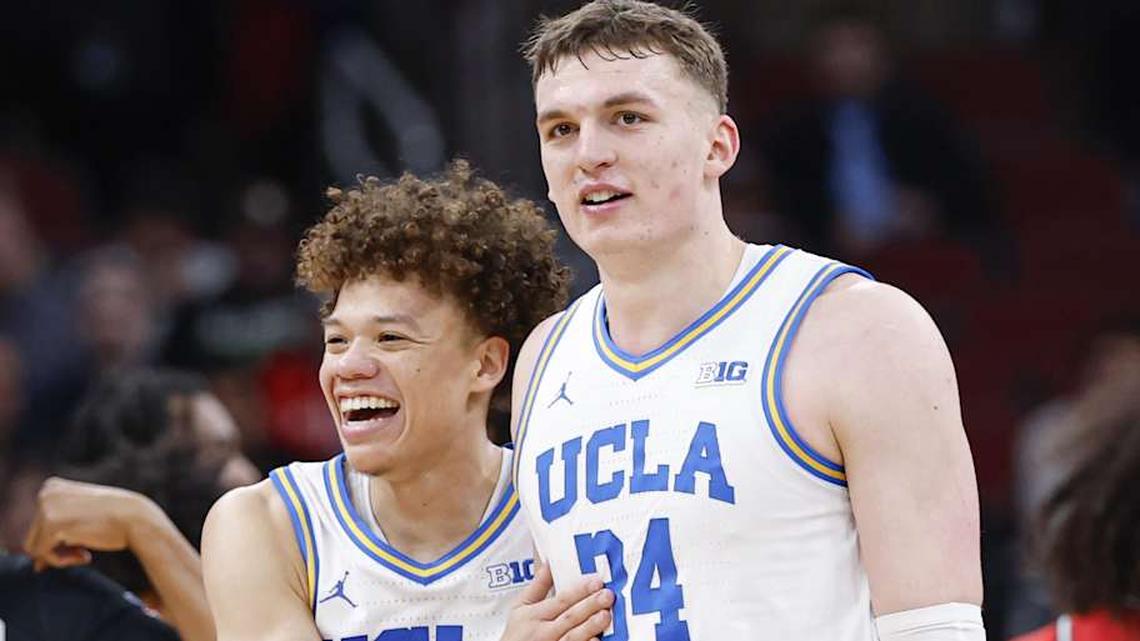  Mar 12, 2026; Chicago, IL, USA; UCLA Bruins guard Trent Perry (0) and forward Tyler Bilodeau (34) smile during the second half at United Center. Mandatory Credit: Kamil Krzaczynski-Imagn Images | Kamil Krzaczynski-Imagn Images 