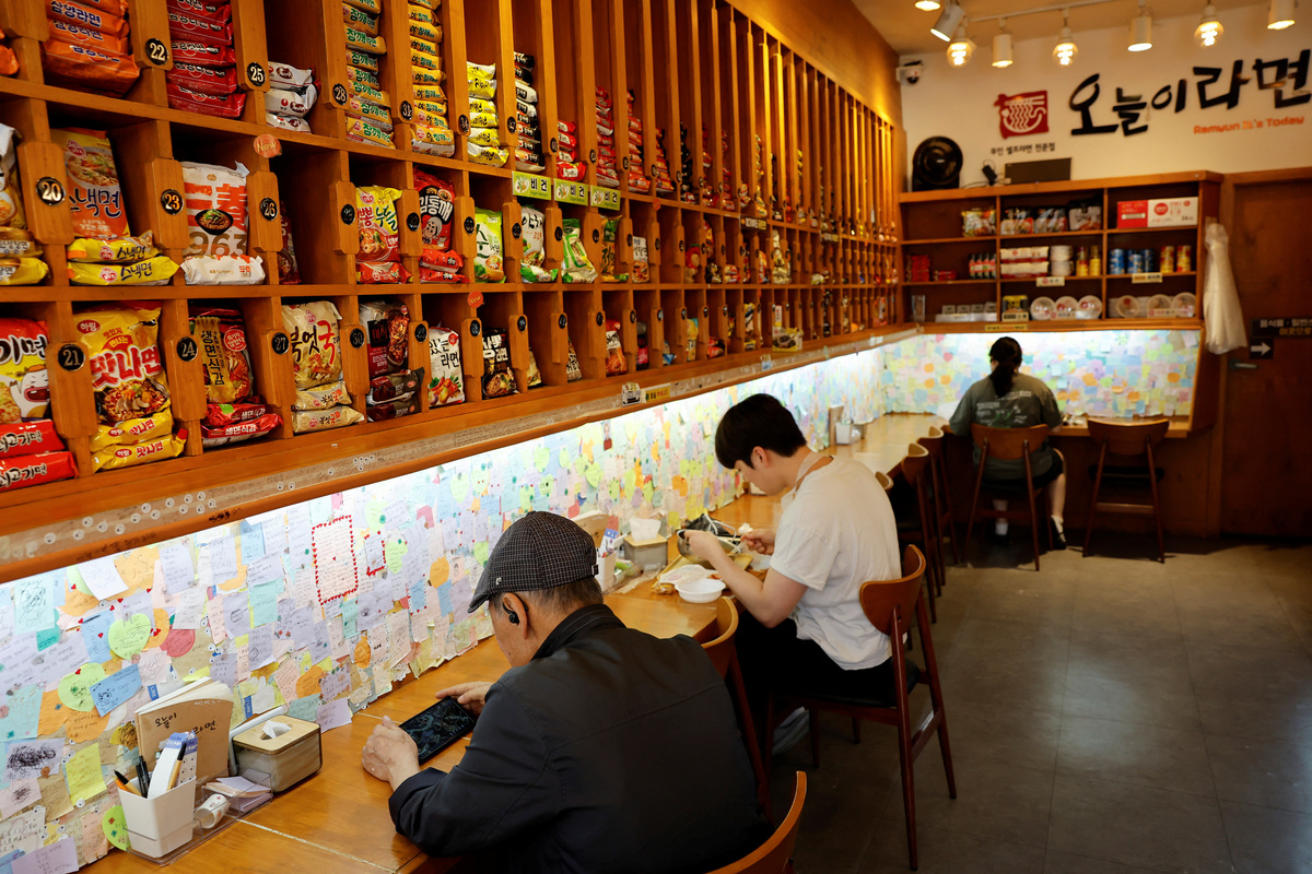 Customers eat instant noodles at an unmanned ramen eatery in Seoul, South Korea, June 5, 2026. REUTERS/Kim Soo-hyeon
