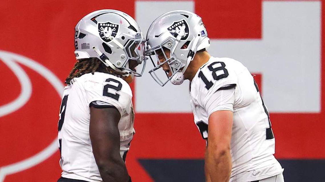  Dec 21, 2025; Houston, Texas, USA; Las Vegas Raiders wide receiver Jack Bech (18) celebrates running back Ashton Jeanty (2) touchdown reception against the Houston Texans in the second half at NRG Stadium. Mandatory Credit: Thomas Shea-Imagn Images | Thomas Shea-Imagn Images 
