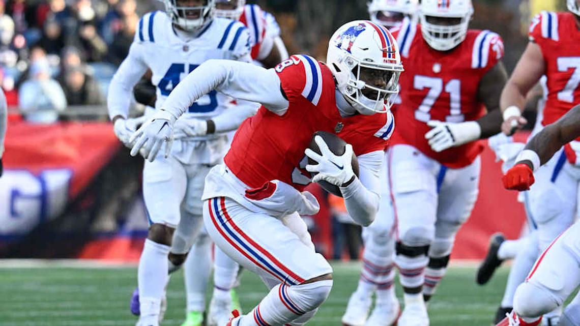  Dec 1, 2024; Foxborough, Massachusetts, USA; New England Patriots wide receiver Kayshon Boutte (9) runs the ball during the first half against the Indianapolis Colts at Gillette Stadium. Mandatory Credit: Eric Canha-Imagn Images | Eric Canha-Imagn Images 