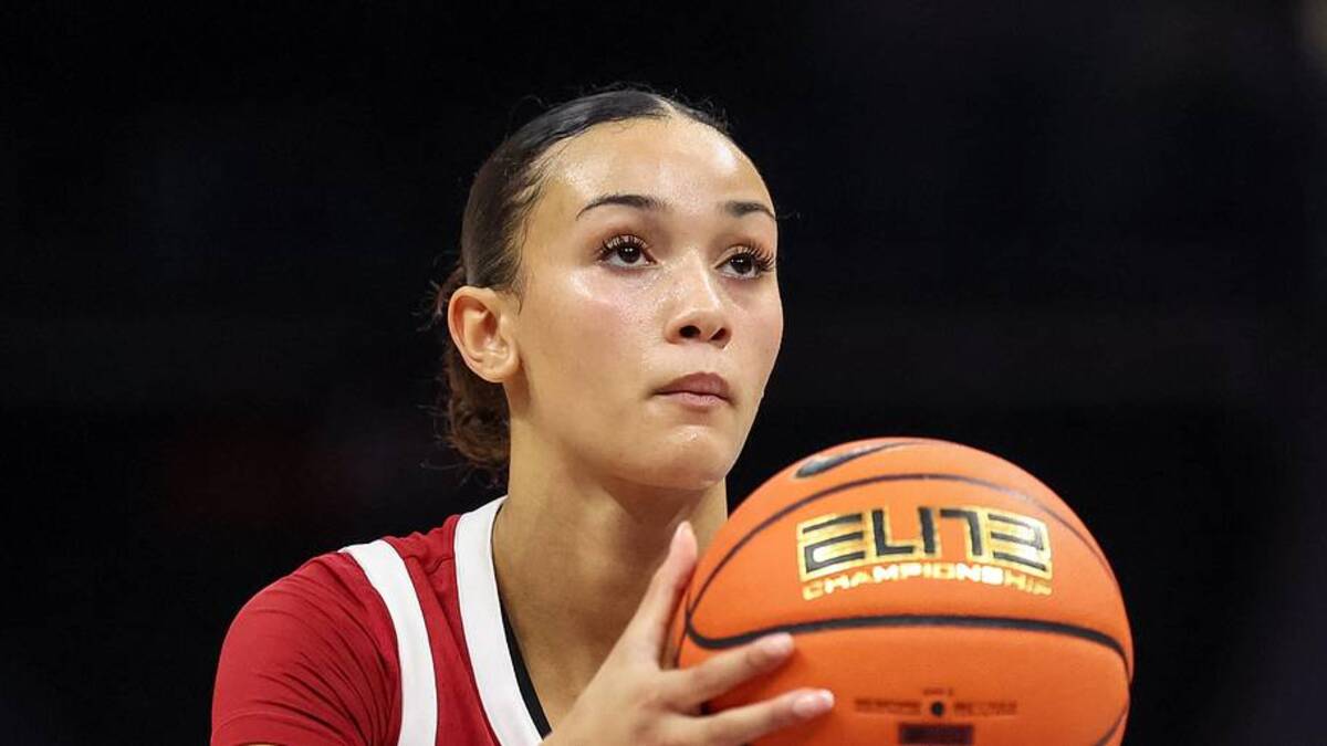  Nov 9, 2025; Charlotte, North Carolina, USA; Southern California Trojans guard Jazzy Davidson (9) makes a free throw against the NC State Wolfpack during the third quarter of the Ally Tipoff game at Spectrum Center. Mandatory Credit: Cory Knowlton-Imagn Images | Cory Knowlton-Imagn Images 