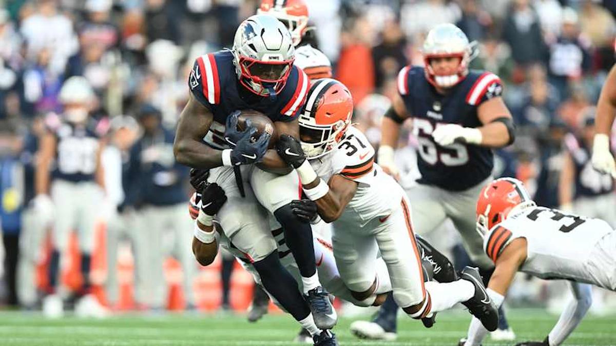  Oct 26, 2025; Foxborough, Massachusetts, USA; New England Patriots running back Terrell Jennings (26) is tackled by Cleveland Browns cornerback Dom Jones (37) during the fourth quarter at Gillette Stadium. Mandatory Credit: Brian Fluharty-Imagn Images | Brian Fluharty-Imagn Images 