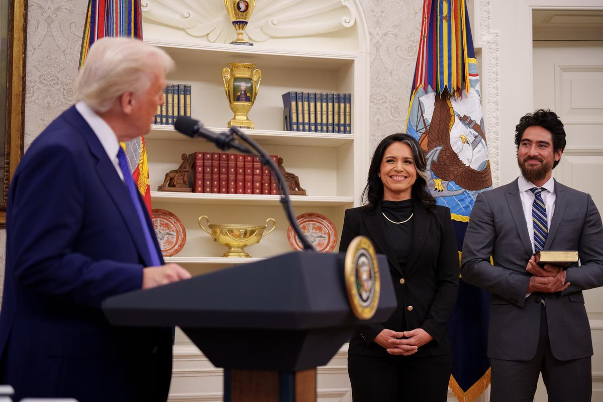  L-R: President Donald Trump, Tulsi Gabbard and Abraham Williams at Gabbard’s swearing-in ceremony at the White House on February 12, 2025. 