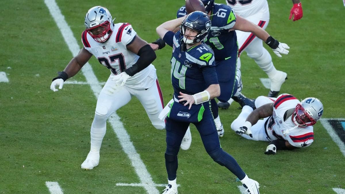 NFL: Super Bowl LX-Seattle Seahawks at New England Patriots. Feb 8, 2026; Santa Clara, CA, USA; Seattle Seahawks quarterback Sam Darnold (14) throws a pass against the New England Patriots in the first half in Super Bowl LX at Levi's Stadium. Mandatory Credit: Kirby Lee-Imagn Images