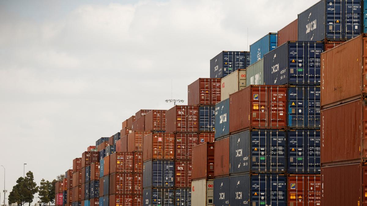 Shipping containers are stacked at the port of Los Angeles in Long Beach, California, U.S., March 10, 2026. REUTERS/Caroline Brehman