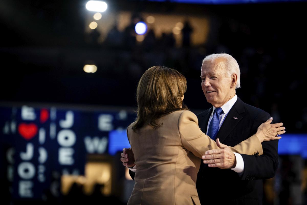 FILE -- Vice President Kamala Harris hugs President Joe Biden at the end of the first night of the Democratic National Convention in Chicago, Aug. 19, 2024. The Democratic National Committee on Thursday released a nearly 200-page draft of an internal autopsy of what went wrong in the 2024 campaign, ending months of speculation that had emerged as an embarrassing public spectacle for the party as it seeks to regain control of Congress. (Erin Schaff/The New York Times)