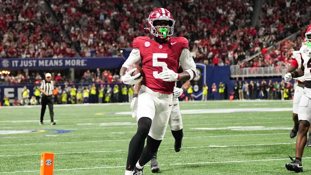 Dec 6, 2025; Atlanta, GA, USA; Alabama Crimson Tide wide receiver Germie Bernard (5) scores a touchdown during the fourth quarter against the Georgia Bulldogs during the 2025 SEC Championship game at Mercedes-Benz Stadium. Mandatory Credit: Dale Zanine-Imagn Images | Dale Zanine-Imagn Images 