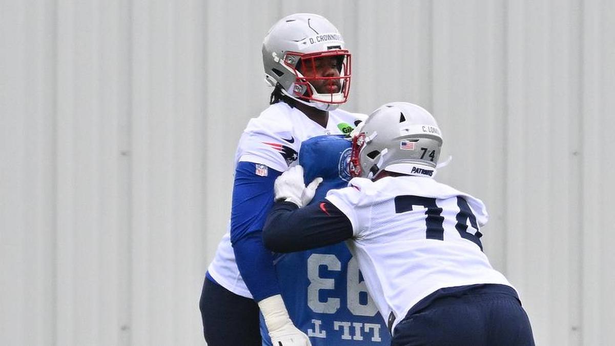  May 9, 2026; Foxborough, MA, USA; New England Patriots tackle Caleb Lomu (74) works on drills with tackle Dametrious Crownover (68) during the New England Patriots rookie camp at Gillette Stadium. Mandatory Credit: Eric Canha-Imagn Images | Eric Canha-Imagn Images 