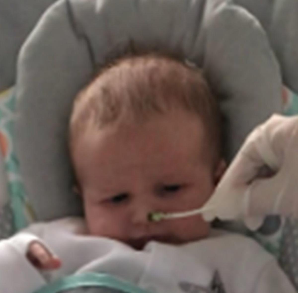  The same child whose mother took kale capsules during pregnancy as part of a controlled experiment, reacts more favorably to the smell of kale when tested at around three weeks after birth. (Durham University via SWNS) 