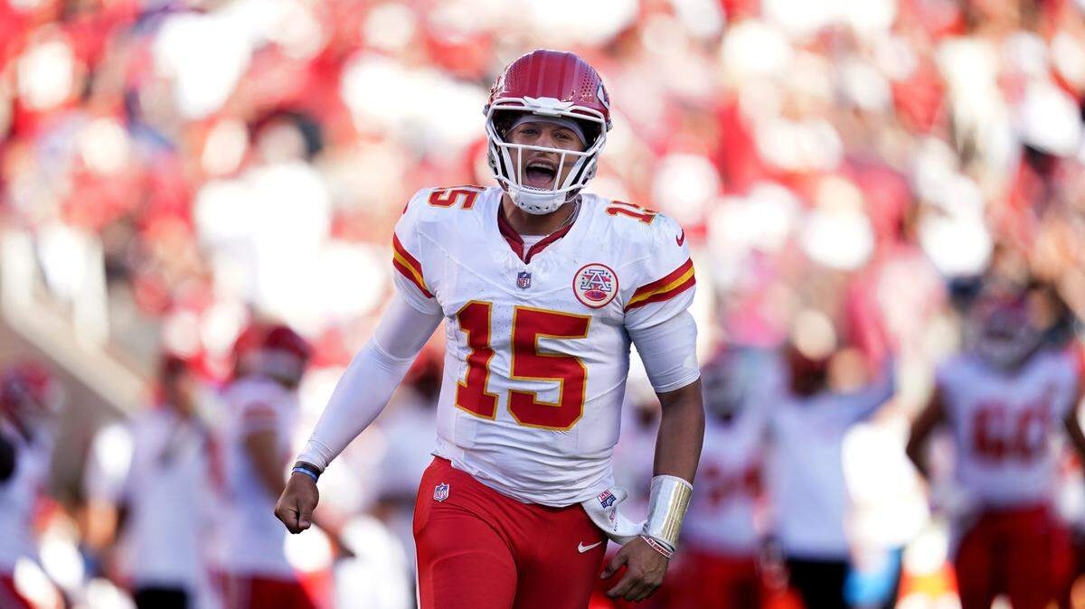 Kansas City Chiefs quarterback Patrick Mahomes (15) reacts after the Chiefs scored a touchdown against the San Francisco 49ers in the fourth quarter at Levi’s Stadium.
