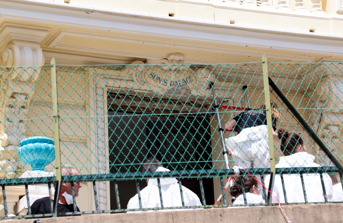 Police officers, and incendiary and explosion experts work at the site of an explosion, that occurred on Monday, in the residential building, in Monaco, June 30, 2026. REUTERS/Alexandre Dimou