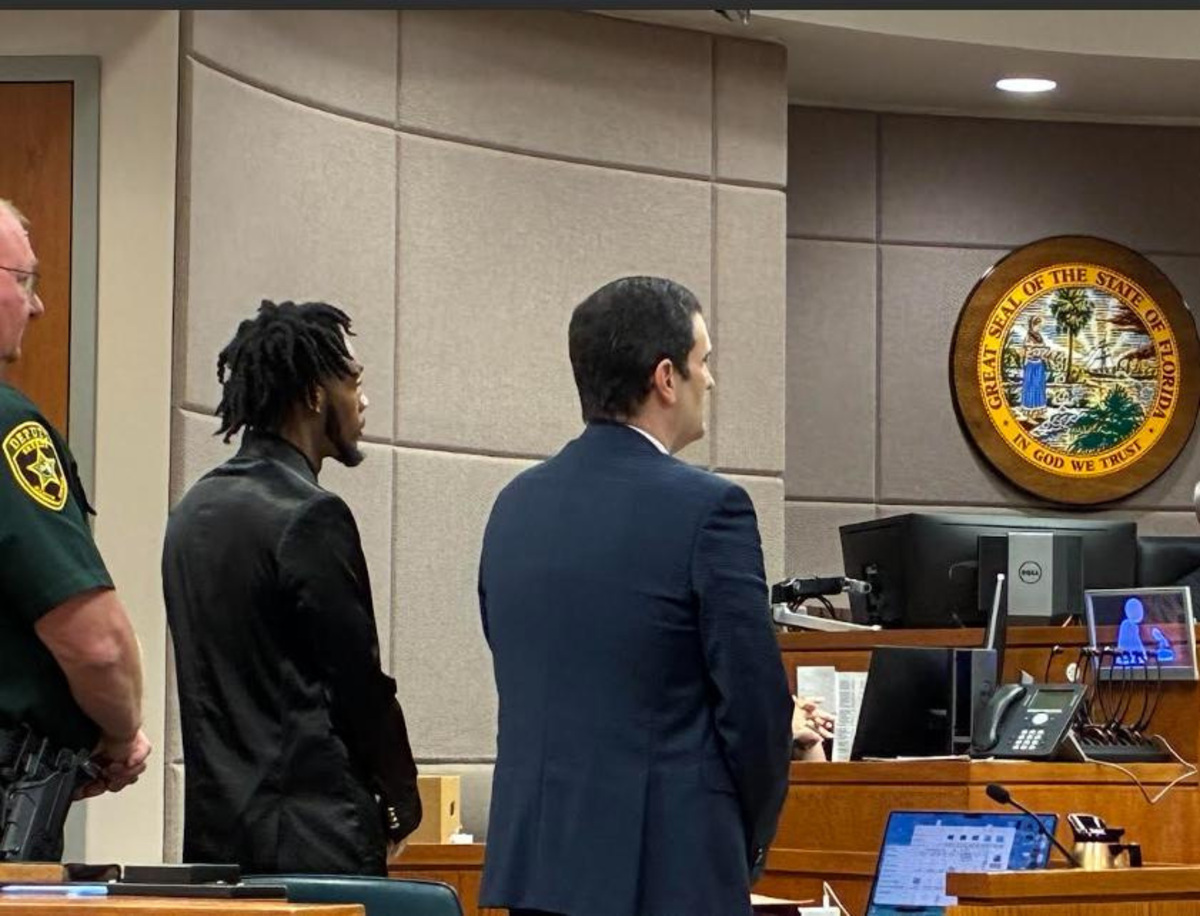 The defense stands as the jury enters the courtroom in the Dexavion J'Neil Brown trial on July 9, 2026.