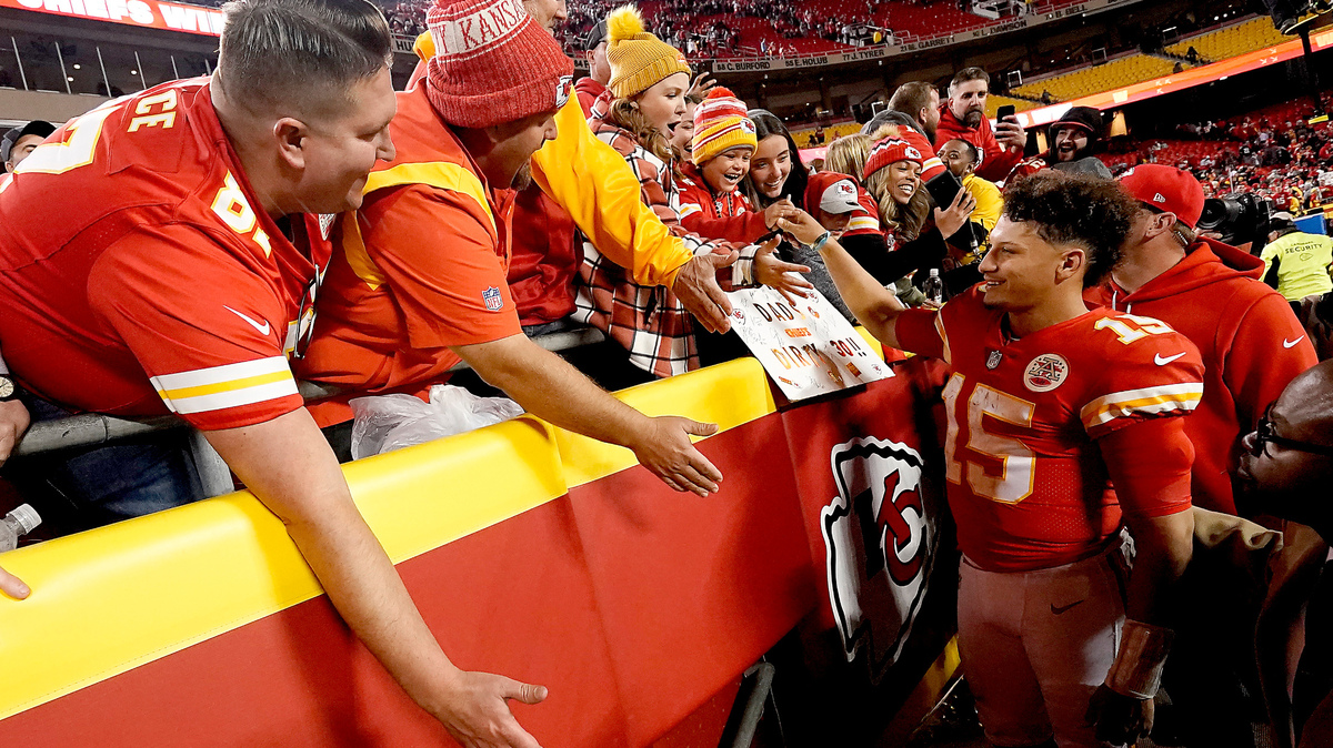 Kansas City Chiefs quarterback Patrick Mahomes celebrates with fans after an NFL football game against the Tennessee Titans Sunday, Nov. 6, 2022, in Kansas City, Mo. The Chiefs won 20-17 in overtime. (AP Photo/Charlie Riedel)