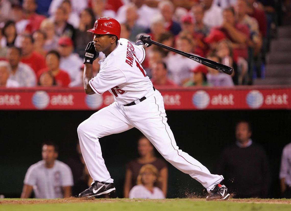  September 8, 2008; Anaheim CA, USA; Los Angeles Angels left fielder Garret Anderson (16) hits a single in the seventh inning against the New York Yankees at Angel Stadium of Anaheim. Mandatory Credit: Gary A. Vasquez-USA TODAY Sports 