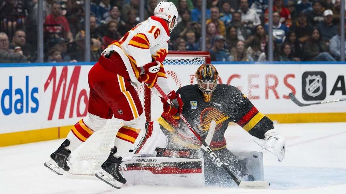 Canucks keep Flames winless with 4-goal third period 