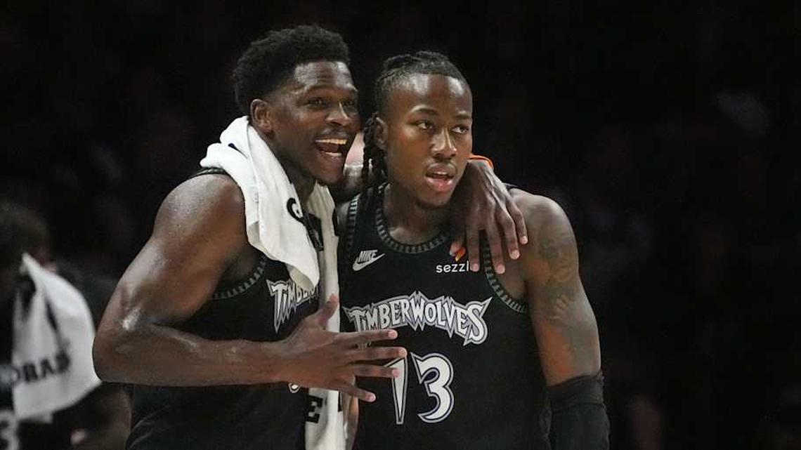  Apr 23, 2026; Minneapolis, Minnesota, USA; Minnesota Timberwolves guard Anthony Edwards (5) talks with guard Ayo Dosunmu (13) during a free throw by the Denver Nuggets in the first quarter at Target Center. Mandatory Credit: Bruce Kluckhohn-Imagn Images | Bruce Kluckhohn-Imagn Images 