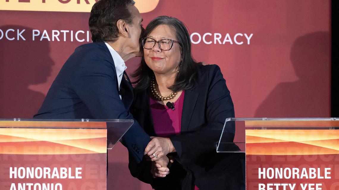 Former Los Angeles mayor Antonio Villaraigosa gives former State Controller Betty Yee a kiss during the California Governor Candidate Forum presented by Empowerment Congress at the California Science Center in Los Angeles, on Jan. 17, 2026. (Myung J. Chun/Los Angeles Times/TNS)