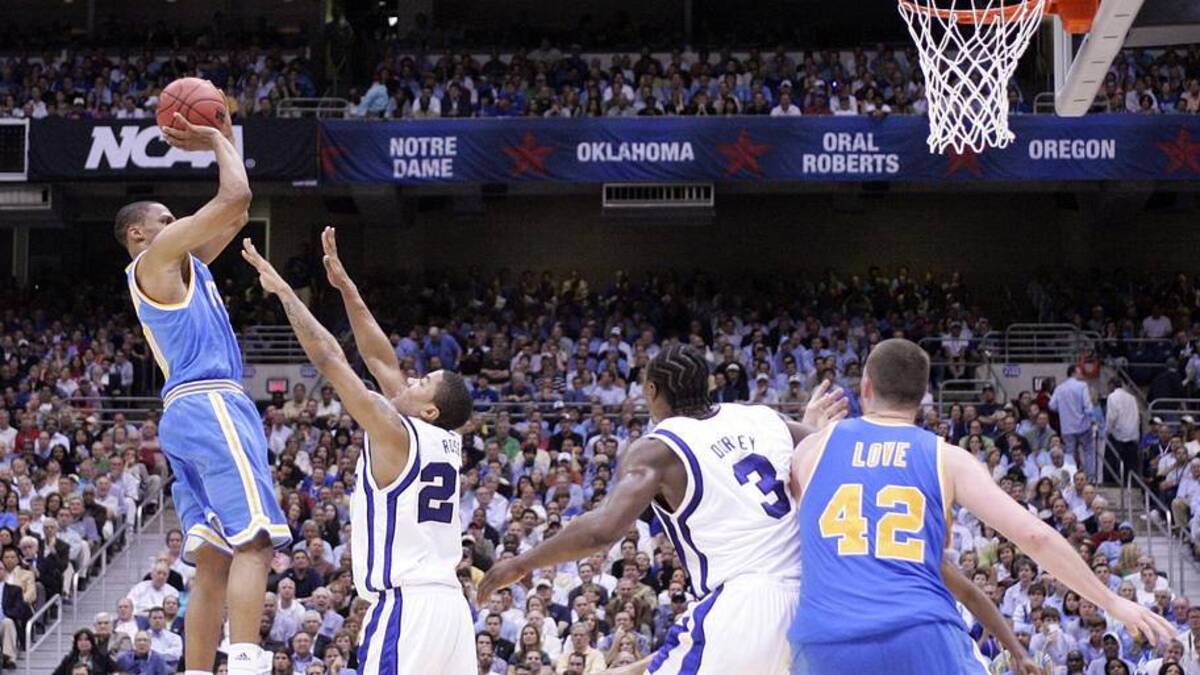  Apr 5, 2008; San Antonio, TX, USA; UCLA Bruins guard Russell Westbrook (0) shoots over Memphis Tigers guard Derrick Rose (23) during the second half of the semi-finals of the 2008 NCAA Mens Final Four Championship at the Alamodome. Memphis defeated UCLA 78-63. Mandatory Credit: Bob Donnan-Imagn Images | Bob Donnan-Imagn Images 