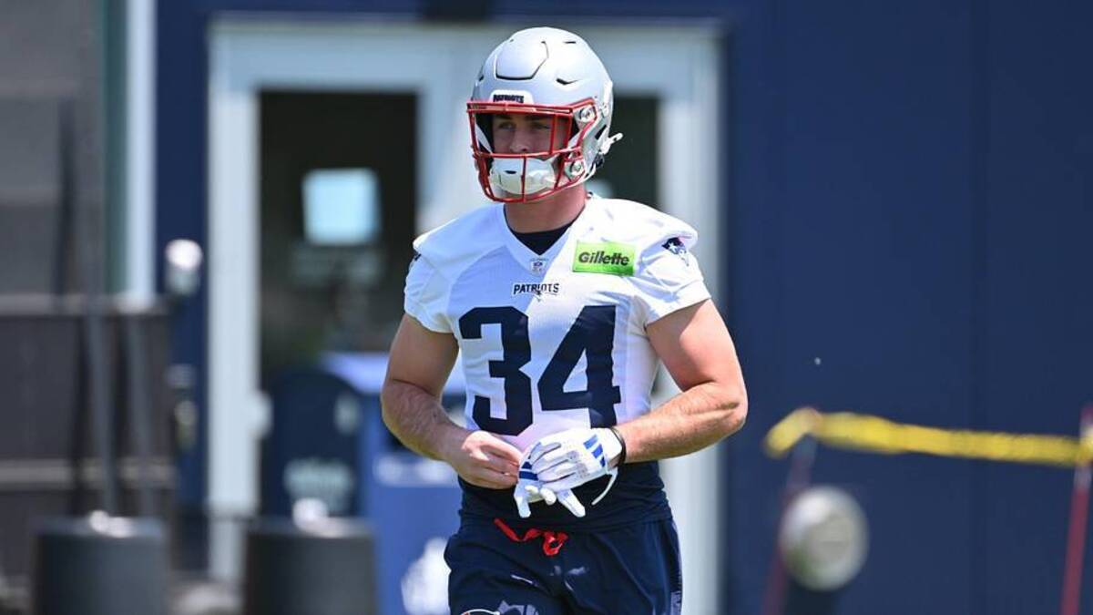  Jun 10, 2026; Foxborough, MA, USA; New England Patriots running back Lan Larison (34) arrives at the practice field for minicamp at Gillette Stadium. Mandatory Credit: Eric Canha-Imagn Images | Eric Canha-Imagn Images 