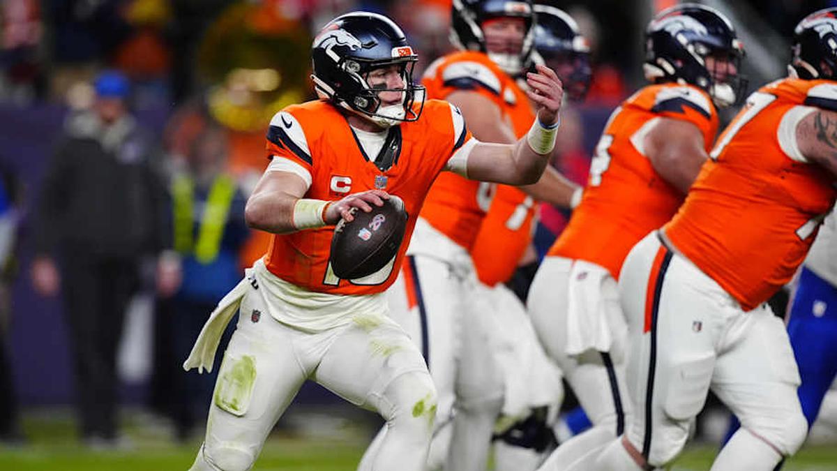  Jan 17, 2026; Denver, CO, USA; Denver Broncos quarterback Bo Nix (10) scrambles during the fourth quarter of an AFC Divisional Round playoff game against the Buffalo Bills at Empower Field at Mile High. Mandatory Credit: Ron Chenoy-Imagn Images | Ron Chenoy-Imagn Images 