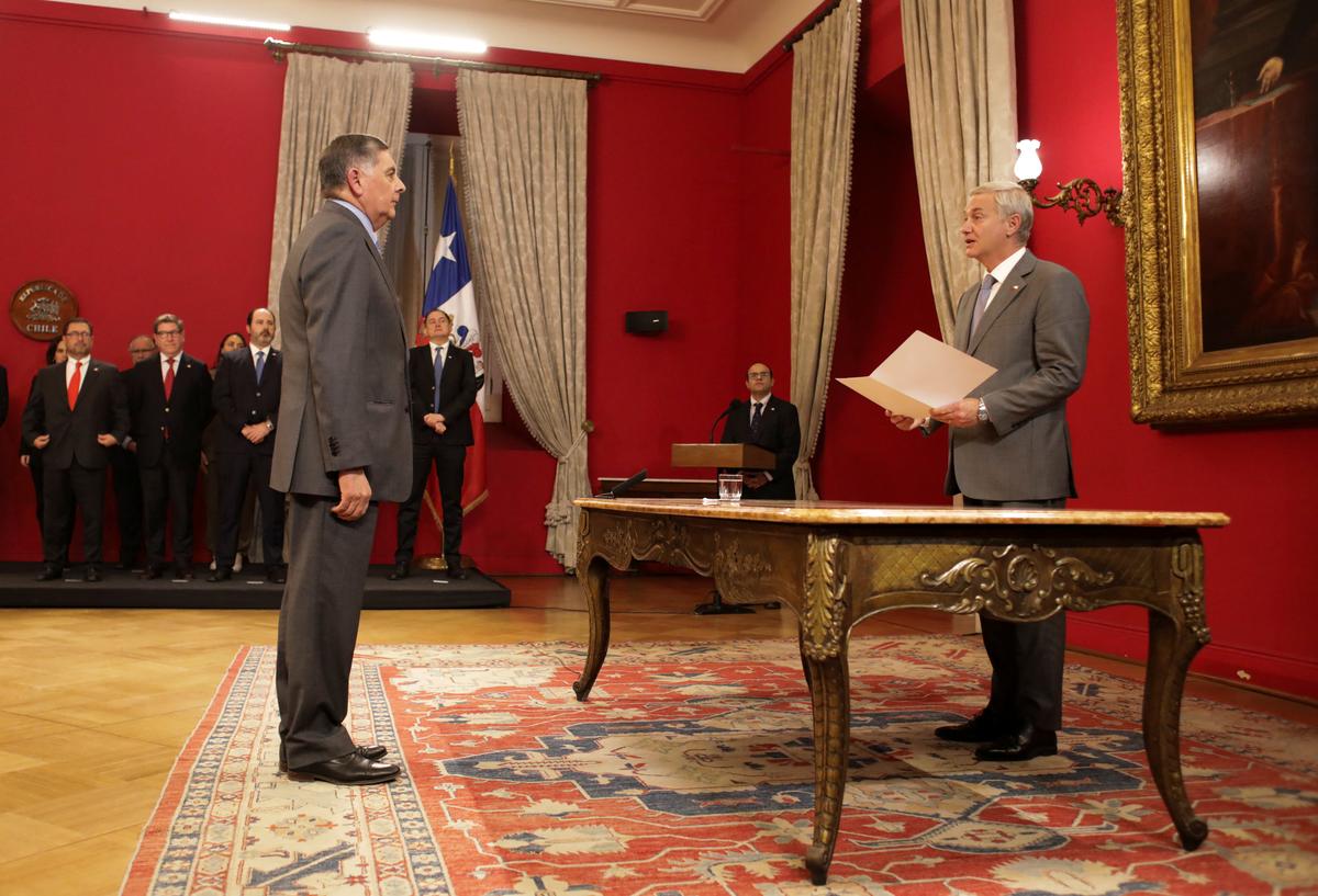 Claudio Alvarado,who was appointed as Chile's new government spokesperson by Chilean President Jose Antonio Kast, stands during a cabinet shuffle announcement at La Moneda Presidential Palace in Santiago, Chile, May 19, 2026. REUTERS/Diego Reyes
