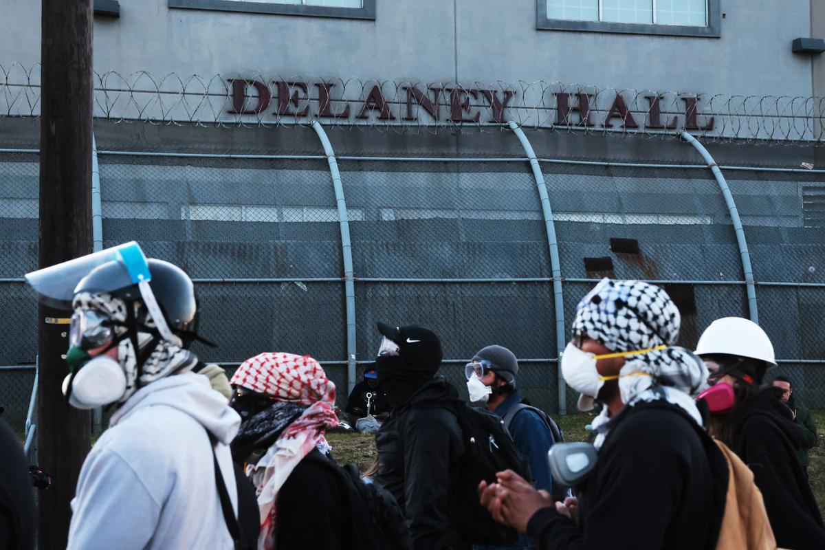  Protesters clash with police outside the federal immigration center at Delaney Hall in Newark, New Jersey, where ICE is housing detained immigrants, on May 30, 2026. 