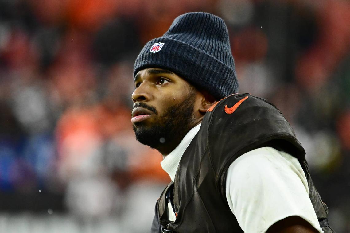  Dec 7, 2025; Cleveland, Ohio, USA; Cleveland Browns quarterback Shedeur Sanders (12) watches from the sidelines late in the fourth quarter against the Tennessee Titans at Huntington Bank Field. Mandatory Credit: Ken Blaze-Imagn Images 