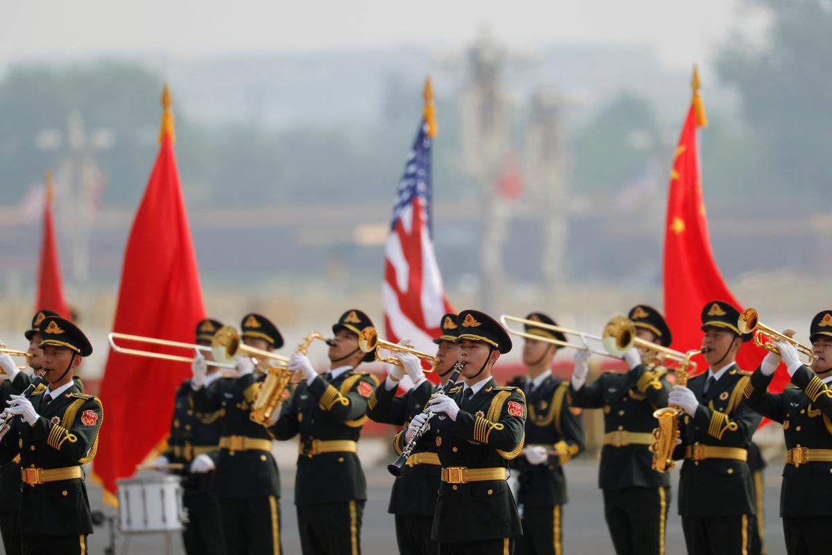 Chinese People's Liberation Army (PLA) honour guards rehearse before the welcome ceremony for U.S. President Donald Trump by Chinese President Xi Jinping at the Great Hall of the People in Beijing, China May 14, 2026. REUTERS/Maxim Shemetov/Pool
