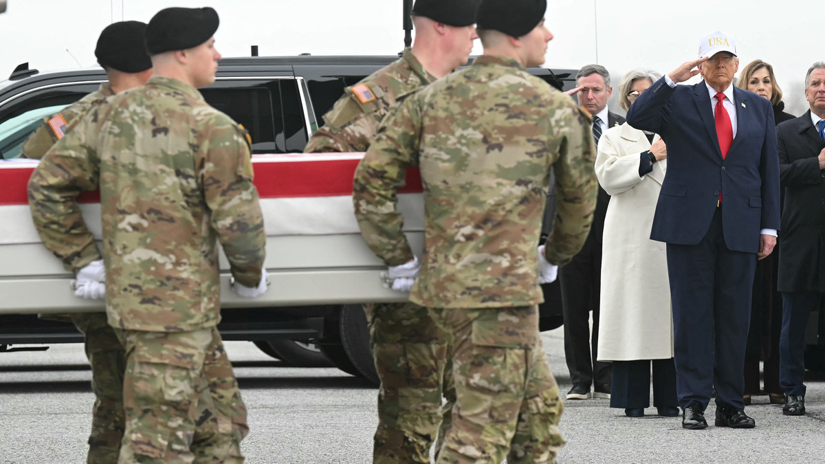 Members of a U.S. Army team carry a flag-draped transfer case containing the remains of U.S. soldier Capt. Cody A. Khork during a dignified transfer solemn event at Dover Air Force Base, in Dover, Del., on March 7, 2026. Six U.S. Army soldiers were killed March 1 when an Iranian drone struck a key U.S. command center in Kuwait's southern industrial hub of Port Shuaiba, a day after the United States and Israel launched a sweeping military campaign against Iran. (Saul Loeb/AFP/Getty Images/TNS)