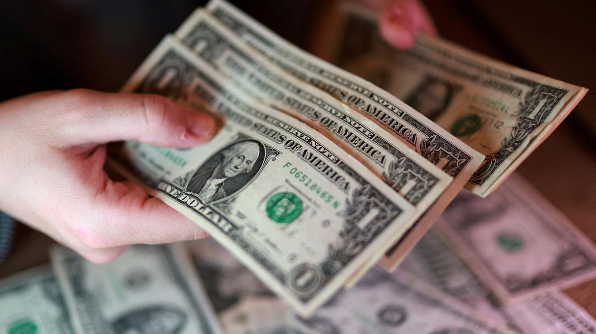 U.S. dollar banknotes are seen in this illustration taken March 24, 2026. REUTERS/Dado Ruvic/Illustration