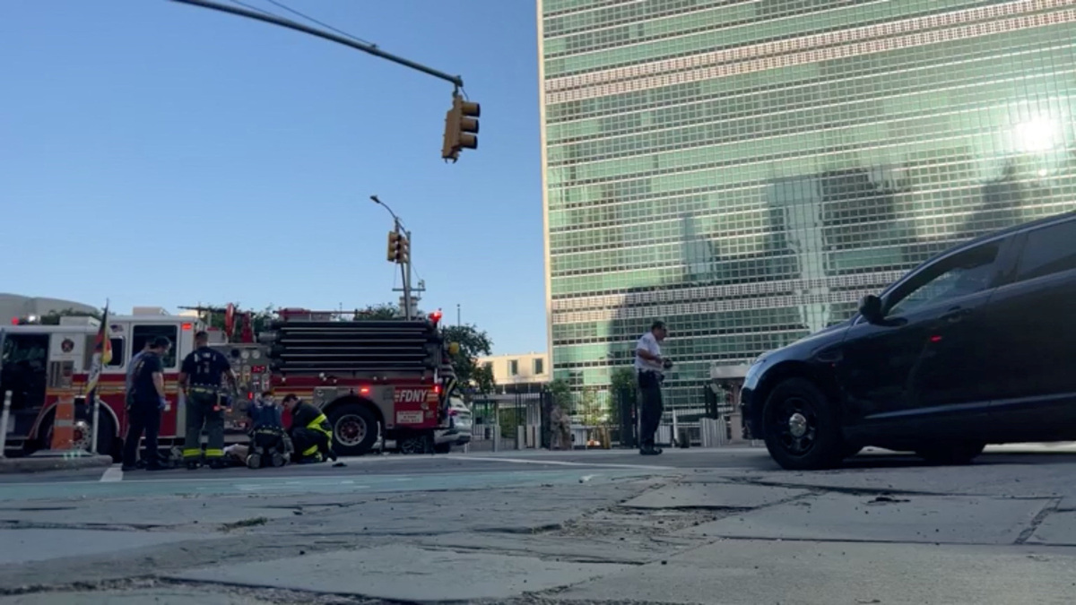 Emergency responders attend to a man identified by Voice of Tibet, a media outlet of exiled Tibetans, as Tibetan activist Lobga Rangzen, after he set himself on fire in an appeal for Tibetan independence, near the United Nations headquarters, in New York, U.S, July 2, 2026 in this still image obtained from social media video. Lobga Rangzen via Facebook/via REUTERS