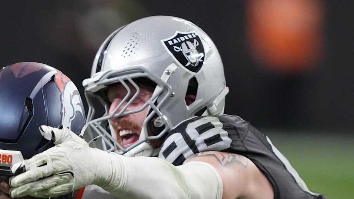  Dec 7, 2025; Paradise, Nevada, USA; Denver Broncos wide receiver Marvin Mims Jr. (19) is tackled by Las Vegas Raiders defensive end Maxx Crosby (98) during the second half at Allegiant Stadium. Mandatory Credit: Kirby Lee-Imagn Images | Kirby Lee-Imagn Images 