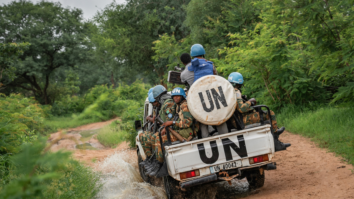 Zambian soldiers belonging to MINUSCA ride a vehicle as the peacekeepers go on patrol along a main axis leading out of Birao on Aug. 11, 2024. MINUSCA is a United Nations peacekeeping mission that operates in the Central African Republic, focusing on protecting civilians, facilitating humanitarian assistance, and supporting the peace process in a country affected by years of conflict. (Amaury Falt-Brown/AFP/Getty Images/TNS)