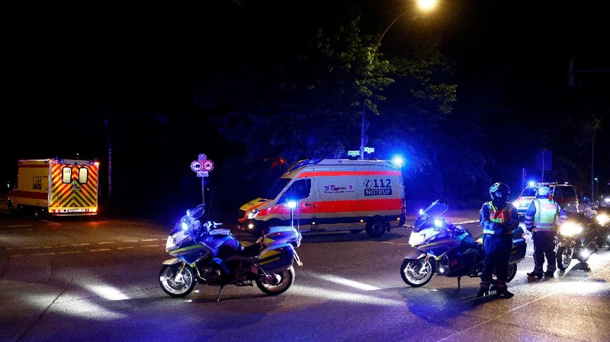 A convoy with an ambulance believed to be carrying an American health worker, who has been brought to Germany for treatment after contracting Ebola in the Democratic Republic of Congo, arrives at the Charite University Hospital in Berlin, Germany, May 20, 2026. REUTERS/Axel Schmidt