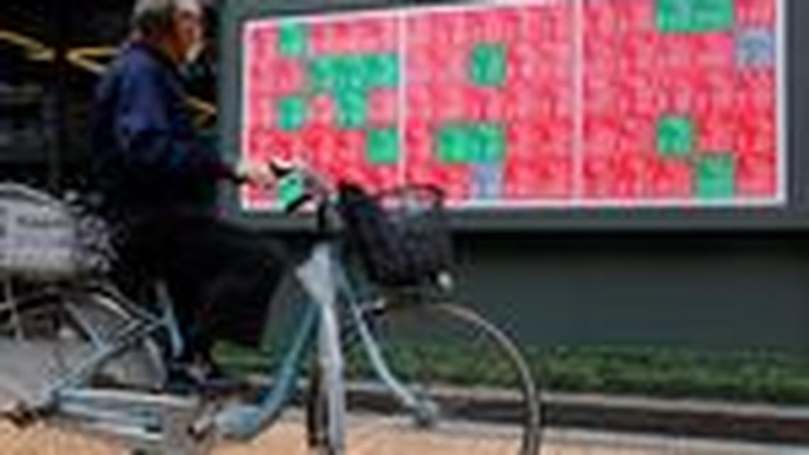 Asian stocks hit record high, dollar wobbles on peace deal hopes 