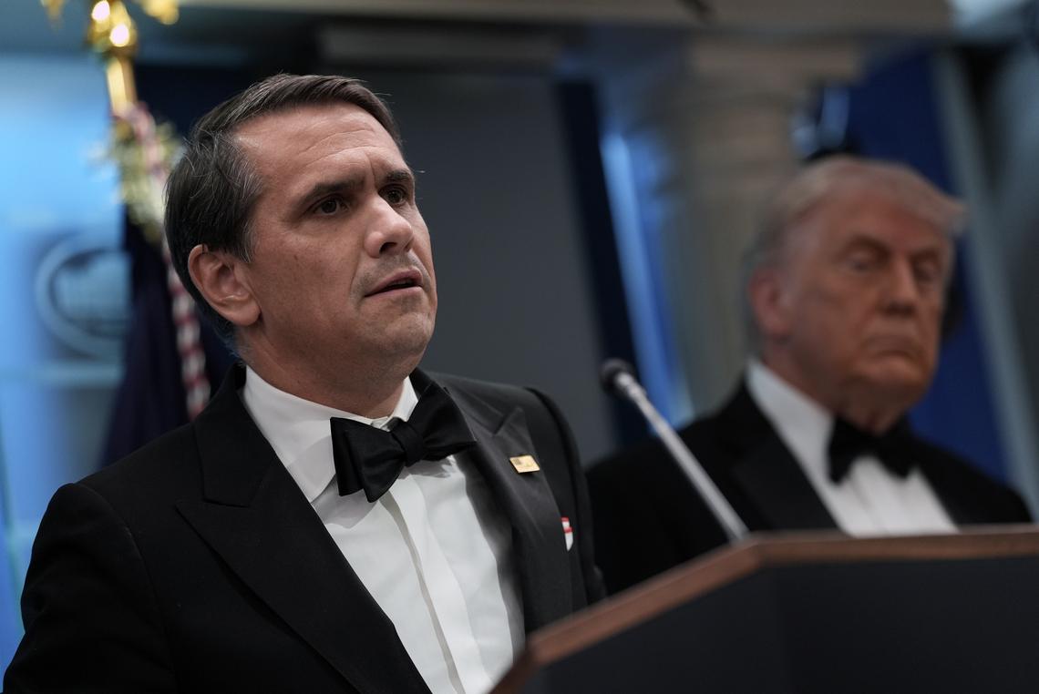President Donald Trump looks on as Acting Attorney General Todd Blanche briefs reporters at the White House after shots were fired during the White House Correspondents' Association dinner at the Washington Hilton in Washington on Saturday, April 25, 2026. Trump was rushed from the stage but was unharmed. (Salwan Georges/The New York Times)