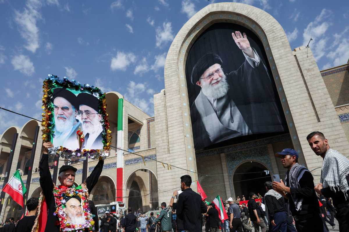 People attend a public farewell ceremony to pay their respects to late Supreme Leader Ayatollah Ali Khamenei, who was killed on February 28 in Israeli and U.S. airstrikes, at the Imam Khomeini Grand Mosalla, in Tehran, Iran July 4, 2026.  REUTERS/Murad Sezer  Foreign media in Iran operate under guidelines set by the Ministry of Culture and Islamic Guidance, which regulates press activity and permissions
