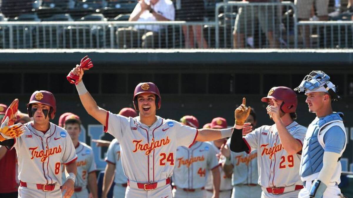  Jun 5, 2026; Chapel Hill, NC, USA; USC infielder Dean Carpentier (6) and teammates celebrate his grand slam against the North Carolina Tar Heels in the sixth inning at Boshamer Stadium. Mandatory Credit: Zachary Taft-Imagn Images | Zachary Taft-Imagn Images 