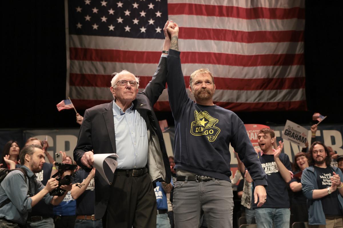  Sen. Bernie Sanders (I-VT) and Democratic U.S. Senate candidate Graham Platner stand together during a "Fighting Oligarchy" tour stop at the Collins Center for the Arts on the University of Maine campus on May 24, 2026, in Orono, Maine. (Photo by Joe Raedle/Getty Images) 